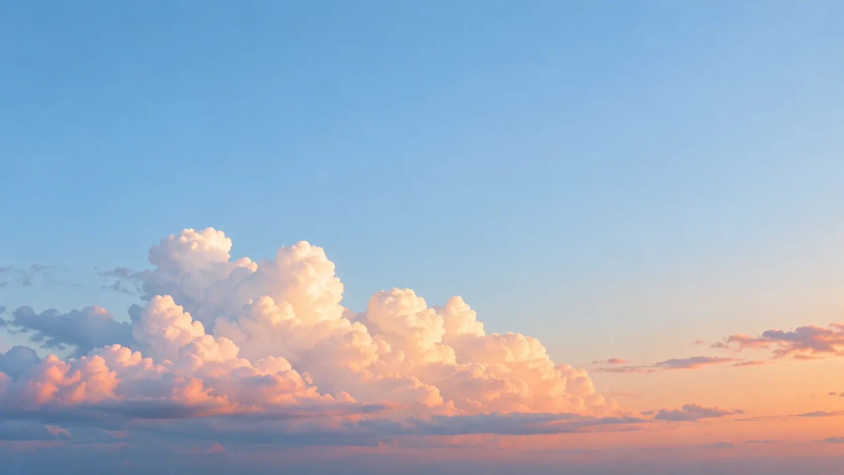 a warm cumulus cloud at sunset